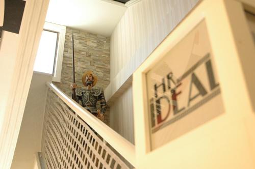 a staircase in a home with a stair railing at Hotel Ideal in Villarrobledo