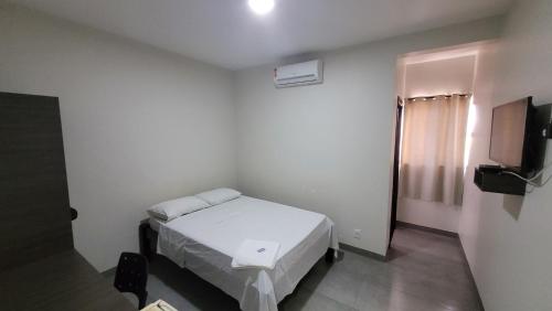 Postel nebo postele na pokoji v ubytování Hotel Valentine