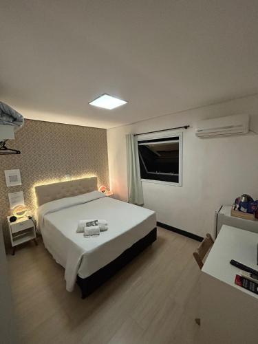 55 Smart Hotelにあるベッド