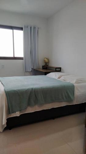 Postel nebo postele na pokoji v ubytování Apartamento tipo stúdio