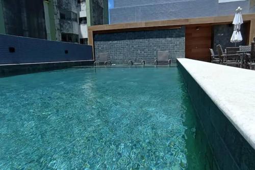 Bazén v ubytování Apartamento tipo stúdio nebo v jeho okolí