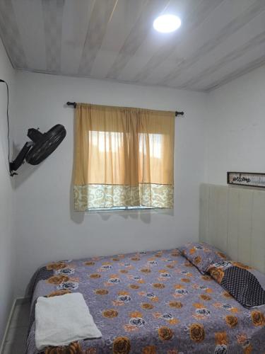 En eller flere senger på et rom på Hostal Altamar De La Guajira