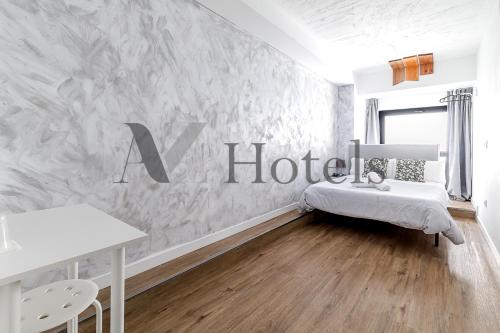 Katil atau katil-katil dalam bilik di AYZ Princesa-Auto check-in property