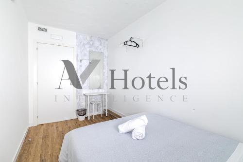 Katil atau katil-katil dalam bilik di AYZ Princesa-Auto check-in property