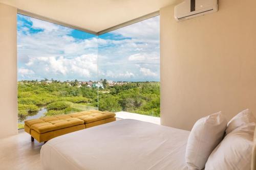 Giường trong phòng chung tại Sunrise Cristal Nest