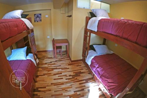 Postel nebo postele na pokoji v ubytování El Parche Rutero Hostel
