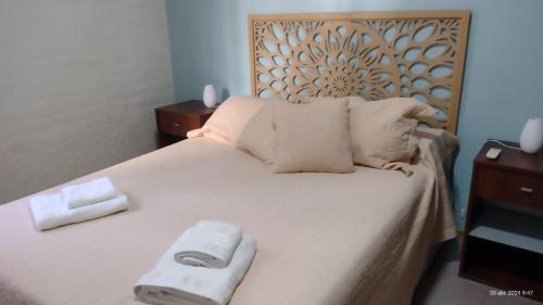 Postel nebo postele na pokoji v ubytování Acogedor departamento.