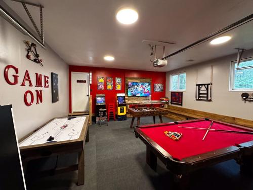 a room with a pool table and a game room at Rustic Poconos Ranch w Game Room in Tobyhanna