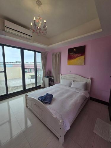 Una cama o camas en una habitación de Shui Young B&B