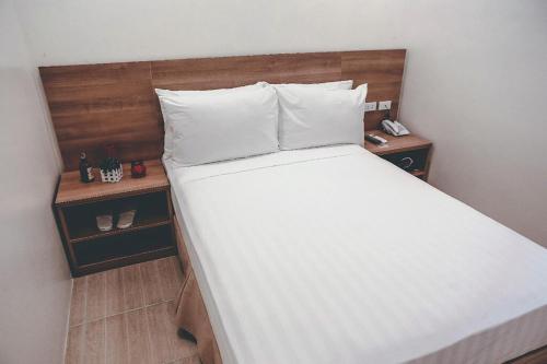 Trip Inn Legazpi City near Airportにあるベッド