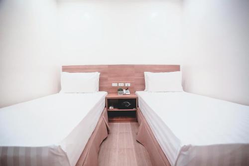 Trip Inn Legazpi City near Airportにあるベッド