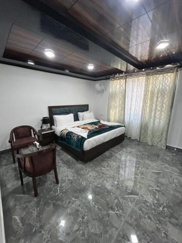 Cama o camas de una habitación en Hotel Lal's Inn