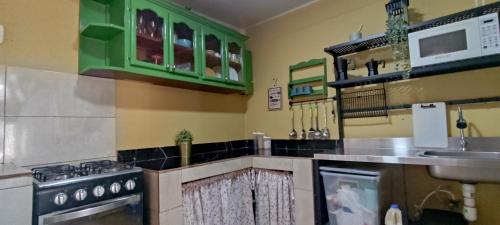 Η κουζίνα ή μικρή κουζίνα στο Chulavista Constanza casa campito