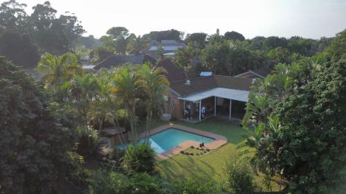 an aerial view of a house with a swimming pool at Kuhle's Guest House in Richards Bay