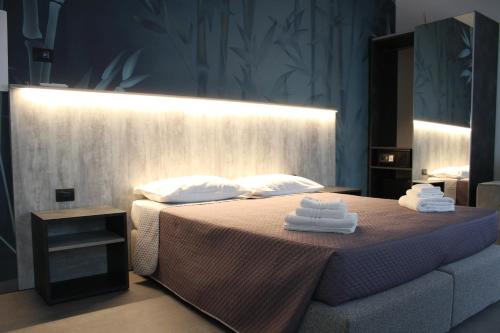 Postel nebo postele na pokoji v ubytování Hotel Paradiso