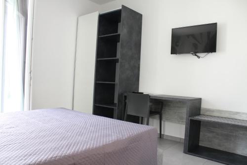 TV a/nebo společenská místnost v ubytování Hotel Paradiso