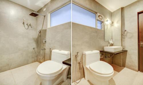 Un baño de Treebo The Sai Leela Suites