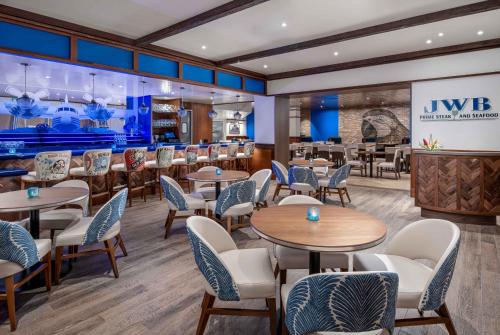 a restaurant with tables and chairs and a bar at Margaritaville Resort Lake Tahoe in South Lake Tahoe
