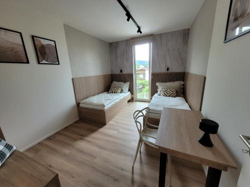 Postel nebo postele na pokoji v ubytování Apartmán BOHEMIKA Deluxe