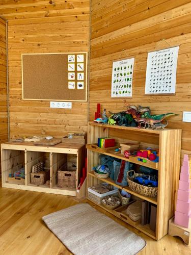 a room with wooden walls and wooden shelves at Akdeniz Villa in Kas