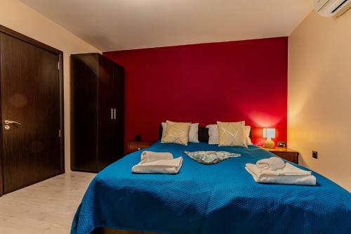 Ένα ή περισσότερα κρεβάτια σε δωμάτιο στο Aleko Apartments City Center