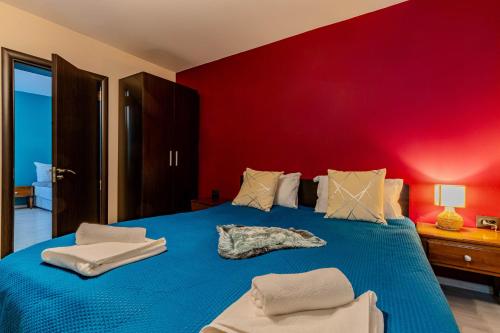 Ένα ή περισσότερα κρεβάτια σε δωμάτιο στο Aleko Apartments City Center