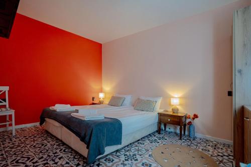 Ένα ή περισσότερα κρεβάτια σε δωμάτιο στο Aleko Apartments City Center