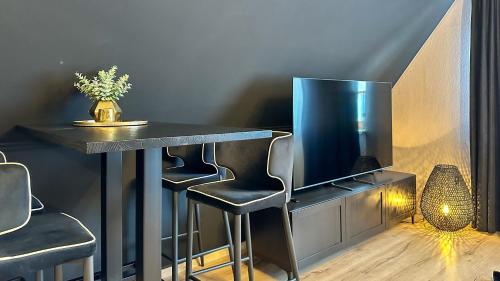 Χώρος καθιστικού στο Apartment Noir No 7 Holzminden