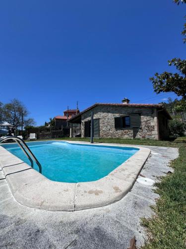 Bazén v ubytování Casa 2 habitaciones con piscina y cenador al aire libre nebo v jeho okolí