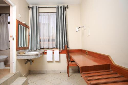 Koupelna v ubytování Paris Hotel