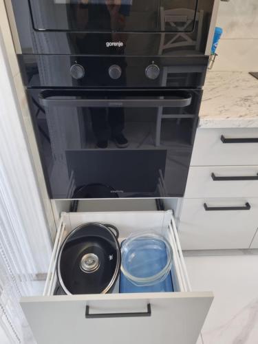 a drawer in a refrigerator with a dishwasher at Bruno 1 in Senj