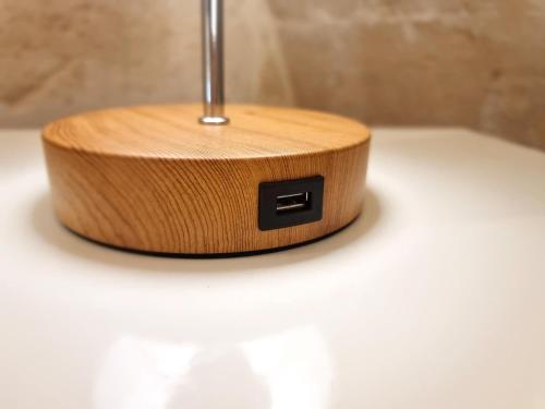 a wooden box sitting on top of a toilet at Casa vacanze San Martino in Ginosa