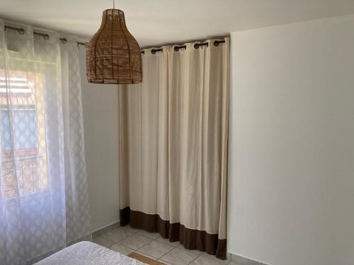 Ένα ή περισσότερα κρεβάτια σε δωμάτιο στο Chambre au calme