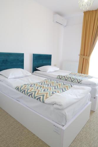 Postel nebo postele na pokoji v ubytování Complex Divad Relax