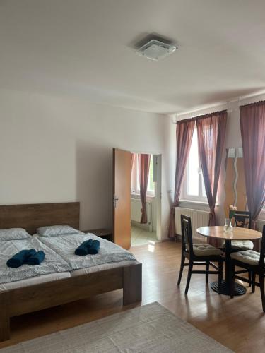 Postel nebo postele na pokoji v ubytování Apartman VAJB