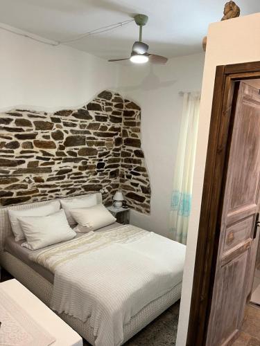 Postel nebo postele na pokoji v ubytování B&B San Gavino