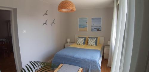 Posteľ alebo postele v izbe v ubytovaní Apartamenty Premium 200m. do plaży