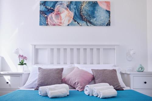 En eller flere senge i et værelse på Casa al mare Circe