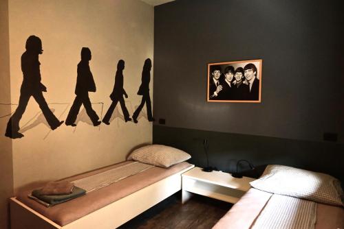 Postel nebo postele na pokoji v ubytování Rock Rooms Pula