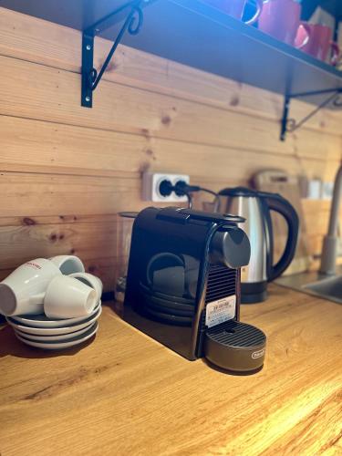 Příslušenství pro přípravu čaje a kávy v ubytování Kuro cottage- A frame