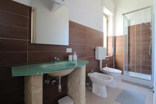 Koupelna v ubytování Acquacorrente Rooms - a due passi dal mare