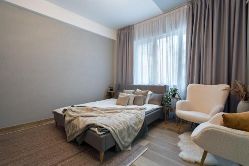 Postel nebo postele na pokoji v ubytování Old Town - Victoriei 25 - UrbanNest Bucharest