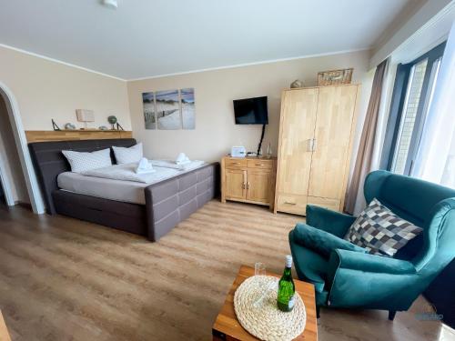 Postel nebo postele na pokoji v ubytování Urlaub in 1. Strandreihe