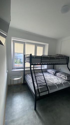 Ένα ή περισσότερα κρεβάτια σε δωμάτιο στο Hostel Harmonia