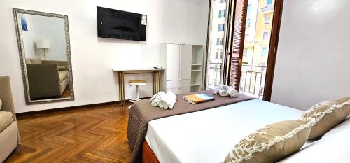 Postel nebo postele na pokoji v ubytování VATICAN ERA Guest House