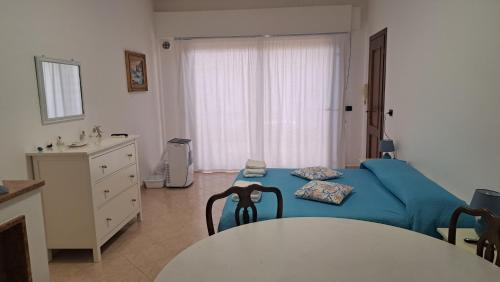 Postel nebo postele na pokoji v ubytování I delfini