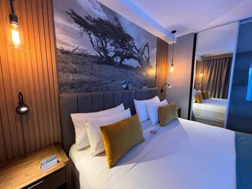Cama ou camas em um quarto em Alto Andino Hotel