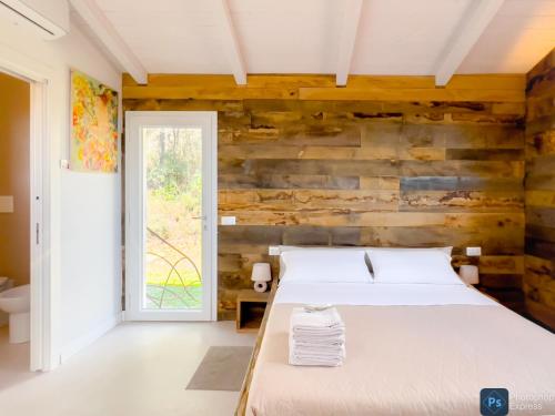 Postel nebo postele na pokoji v ubytování B&B Non ti scordar di me