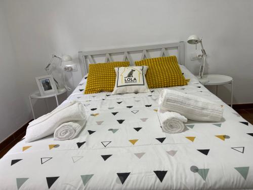 Ένα ή περισσότερα κρεβάτια σε δωμάτιο στο LolaREDONDELA