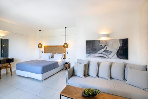 Postel nebo postele na pokoji v ubytování La Stella Suites
